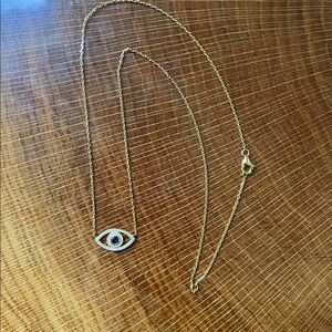 Kensie Evil Eye Necklace – Gold-Tone Pendant with Blue Accent